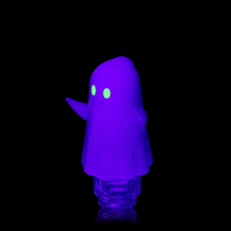 Three-quarter UV view of MJ Arsenal Specter Pivot glass attachment with luminous eyes and ghost silhouette