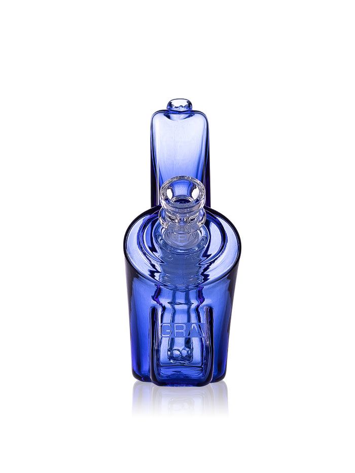 Blue GRAV Wedge glass bubbler front view with clear cup bowl, branded chamber, and compact upright stance