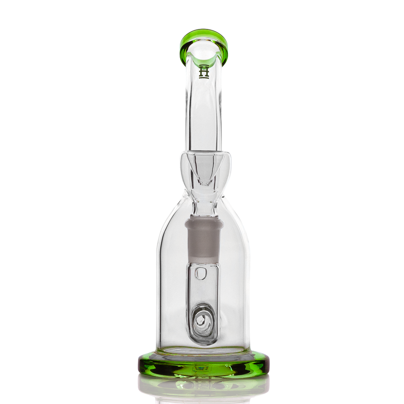 Front view of Hemper Whistler mini glass bong with green lip mouthpiece, bent neck and vertical downstem above round base.