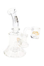 Clear 5.5″ stemless dab rig with beaker base, showerhead perc, angled 14.5 mm attachment, and compact shape