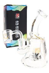 Clear 5.5″ dab rig with showerhead perc, angled quartz-style banger, stemless beaker body, and retail box