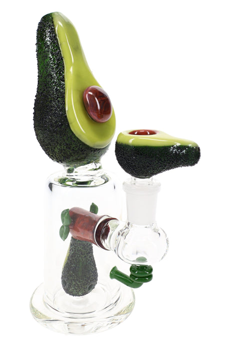 Avocadope glass mini rig with clear beaker body, textured green mouthpiece, and red-brown pit bowl