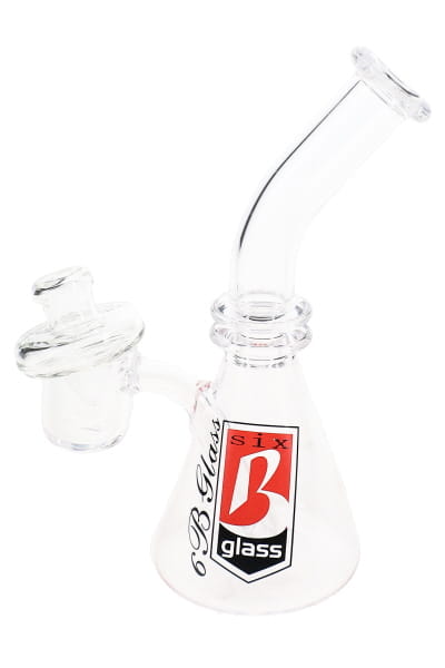 6B Glass mini dab rig with clear conical base, bent neck, attached quartz banger, and carb cap