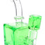 Green fluid-filled cube bong with curved neck and square base, matching bowl seated in glass-on-glass joint.