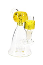 Yellow fluid-filled alien-head beaker bong showing ground-glass joint and compact beaker base.