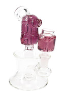 Purple fluid-filled character mini bong with compact chamber, showerhead perc, and clean glass-on-glass joint.