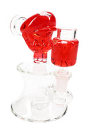 Red-accent plumber-themed mini glass bong showcasing fluid-filled top piece, matching chamber, and showerhead perc.