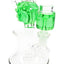 Green-accent 5½″ glass bong with fluid-filled “Ricky” head and matching chamber, stemless design and perc visible.