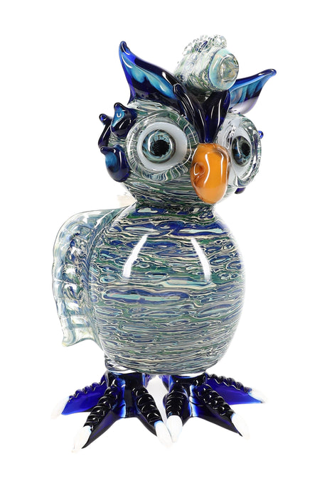 7-inch silver-fumed glass owl bong with sculpted wings, stemless 14.5 mm female joint, and flat base, showing honey-to-blue color shift in front-view studio photo.