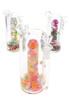 7-inch clear stemless glass bong with 14.5 mm female joint and assorted chamber insert, compact beaker base on a white background.