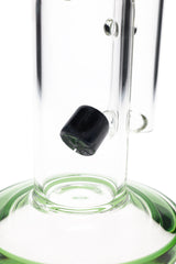 Close-up of the bong’s internal perc diffuser near the base, angled slitted insert inside the straight tube chamber.