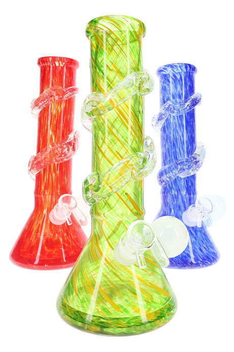 Trio of soft glass beaker bongs with spiral grip rings and side marbles in green, red, and blue; UV-reactive accents; assorted colors, sold individually.