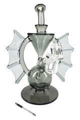 Smoky gray MJ Arsenal Nocturne mini dab rig with bat-wing sides, funnel chamber, and included quartz banger on a round base.