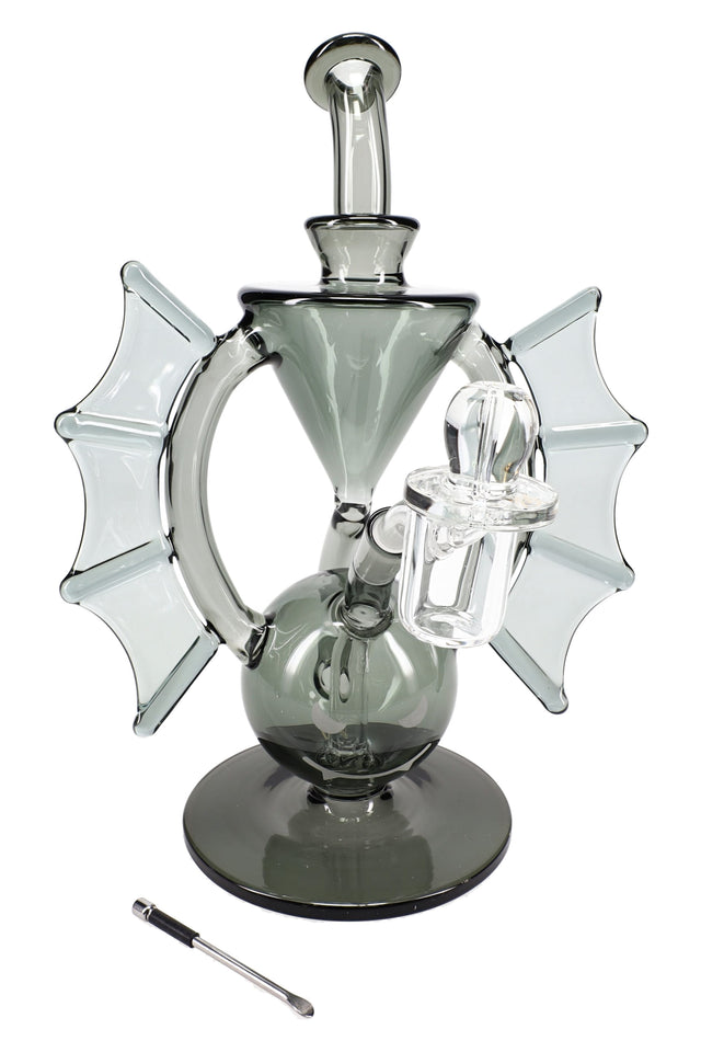 Smoky gray MJ Arsenal Nocturne mini dab rig with bat-wing sides, funnel chamber, and included quartz banger on a round base.