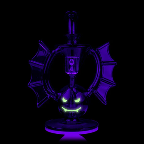 Nocturne rig glowing in the dark with illuminated face accents, bat-wing silhouette visible under blacklight.