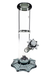 MJ Arsenal Widowmaker straight tube glass bong with matching spider-web bowl, clear chamber and webbed base in smoky gray accents.