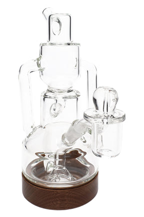 Clear MJ Arsenal Apex mini dab rig with stacked chambers, fixed downstem, quartz banger, and wood-look base ring from the Alpine Collection.