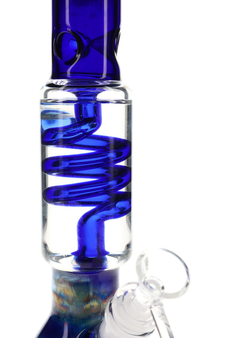 Closeup of blue coil percolator chamber on a 12″ silver-fumed beaker bong, showing diffusion spiral and attached bowl joint.