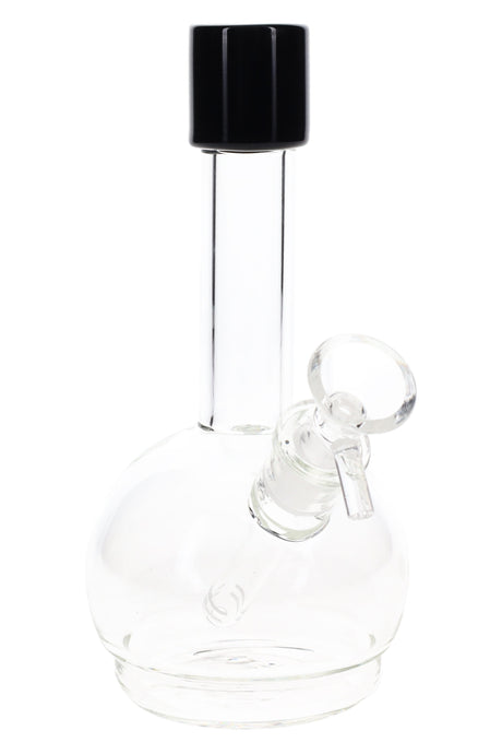 Compact 7″ round-base glass bong with straight neck and glass bowl, clear body with a dark mouthpiece accent, glass-on-glass joint.