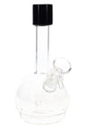 Compact 7″ round-base glass bong with straight neck and glass bowl, clear body with a dark mouthpiece accent, glass-on-glass joint.