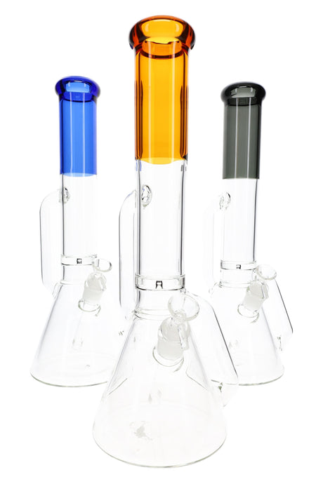 Trio of 16″ recycler beaker bongs with colored necks, glass-on-glass joints, and wide stable bases in assorted colors.