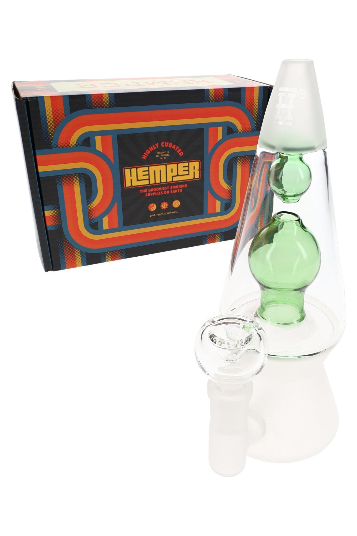 Green Hemper That 70’s 7-inch lava lamp bong posed beside psychedelic retro Hemper box, angled three-quarter view on white backdrop.