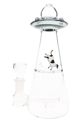 Transparent gray Hemper UFO Vortex glass bong angled to show stemless joint, inline perc chamber and levitating cow illustration.
