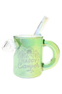 Iridescent green Hemper Happy Camper camping mug glass bong with etched mountain logo and angled straw mouthpiece on white background.