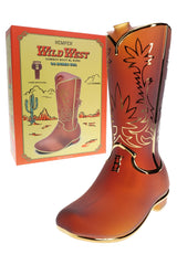 Hemper Wild West Cowboy Boot XL glass bong posed beside its yellow desert-themed retail box, highlighting frosted amber body and gold accents.