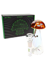 Hemper Trippy Shroom 6-inch iridescent mini bong with red mushroom cap and bowl standing in front of black and green Trippy Mushroom box.