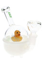 6-inch Hemper Ducky glass bong with white tub base, clear bubble dome and yellow duck centerpiece, angled view on white background for shoppers.