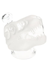 Frosted 4.5-inch Hemper Jurassic Spark dinosaur skull glass bong with clear teeth and base, side angle view on clean white studio background.