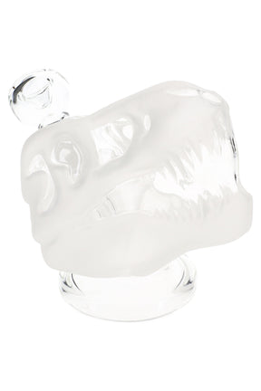 Frosted 4.5-inch Hemper Jurassic Spark dinosaur skull glass bong with clear teeth and base, side angle view on clean white studio background.