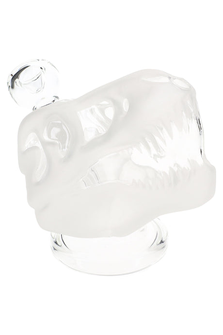 Frosted 4.5-inch Hemper Jurassic Spark dinosaur skull glass bong with clear teeth and base, side angle view on clean white studio background.