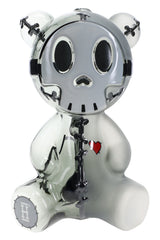 Half-frosted black Hemper Scare Bears Teddy Bear XL glass bong with skull face, stitched details and red heart decal, front angle on white.