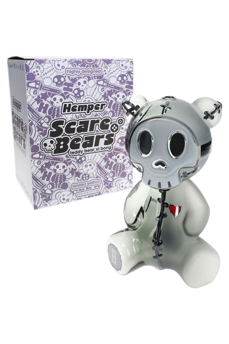 Hemper Scare Bears Teddy Bear XL bong posed beside purple Scare Bears box, creepy-cute character water pipe ready for collectible display.