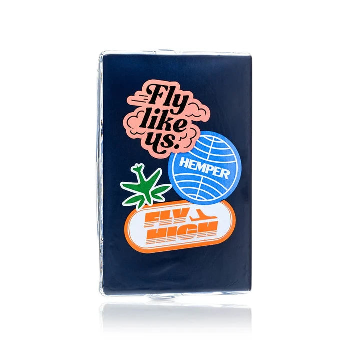 Back of the HEMPER Mile High Passport Hand Pipe featuring colorful sticker-style travel graphics