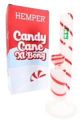 Hemper Candy Cane XL 10½-inch glass bong posed beside red holiday gift box, showing peppermint stripes and included bowl.