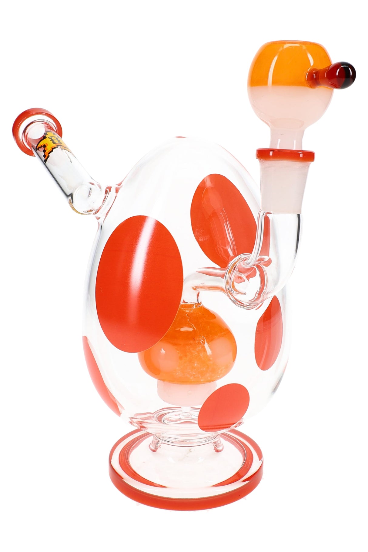 Clear glass bong with red polka dots and red base ring, matching red-topped bowl slide, front view