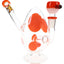 Orange-spotted egg water pipe with angled mouthpiece and matching orange bowl set against a white background.