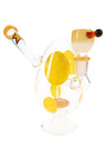Yellow-spotted egg glass bong showing fixed downstem and showerhead perc through the clear chamber.