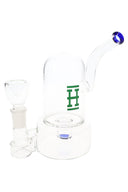 Hemper 7-inch bell bong with clear dome and blue-accent mouthpiece, compact glass water pipe with side-mounted bowl on white.