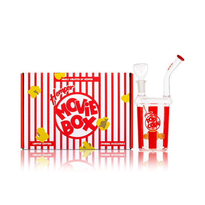 Hemper popcorn mini bong next to Popcorn Box retail package, novelty 6″ glass bong for smooth filtered dry herb pulls