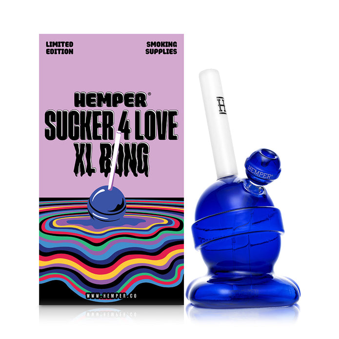 Hemper lollipop XL glass bong beside branded box, tall 9″ candy-style piece with included bowl for smooth dry herb pulls