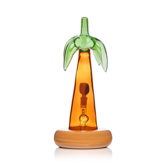 Rear view palm tree bong highlighting green fronds top and amber trunk over opaque sand base, 10.5″ statement piece