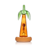 Rear view palm tree bong highlighting green fronds top and amber trunk over opaque sand base, 10.5″ statement piece