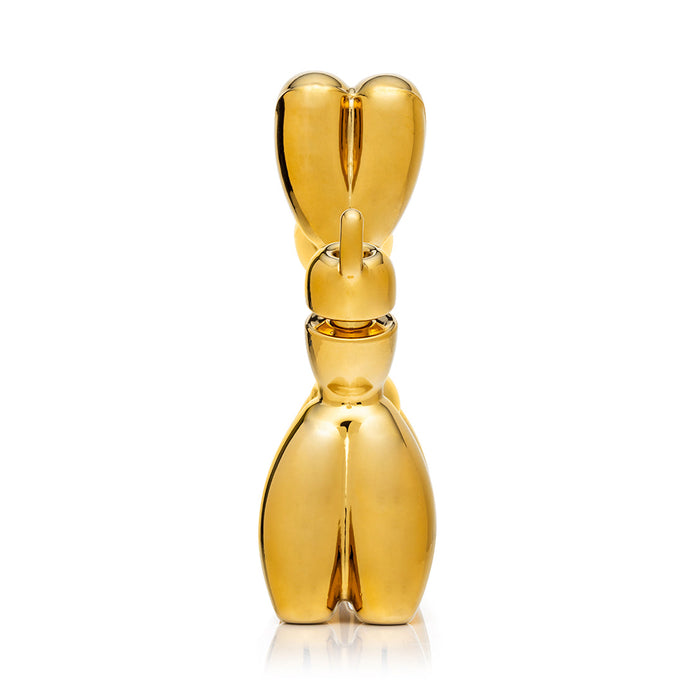 Rear view gold balloon dog bong showing centered tail joint area and standing base, glossy gold display piece