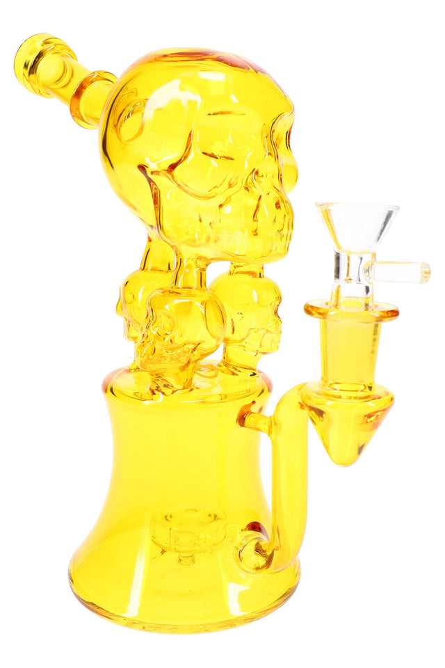 Yellow GoG skull recycler bong with showerhead perc and 14.5 mm female joint, side view with bowl slide