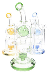 Three GoG Fabergé recycler bongs with green, amber, and blue accents, 11½″ stemless lineup on white
