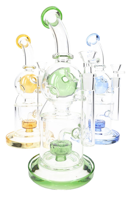 Three GoG Fabergé recycler bongs with green, amber, and blue accents, 11½″ stemless lineup on white